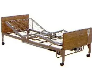 A bed with wooden rails and wheels.
