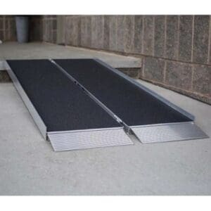 A ramp that is on the ground near some buildings.
